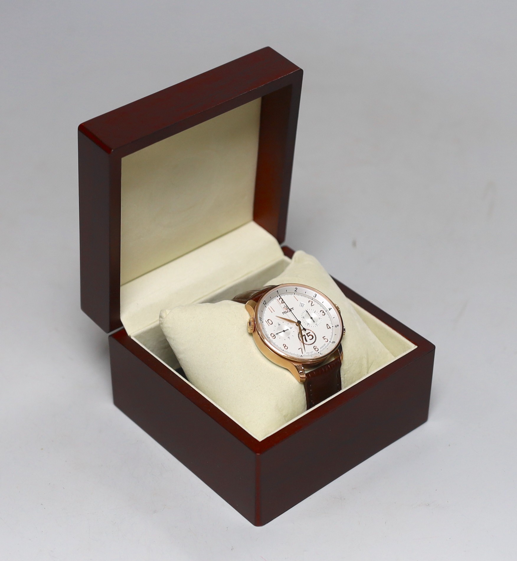 A gentleman's modern limited edition gilt metal Poljot 75 Anniversary chronograph quartz wrist watch, with Arabic numerals and two subsidiary dials, case diameter, 41mm, numbered 054/250 with original box.